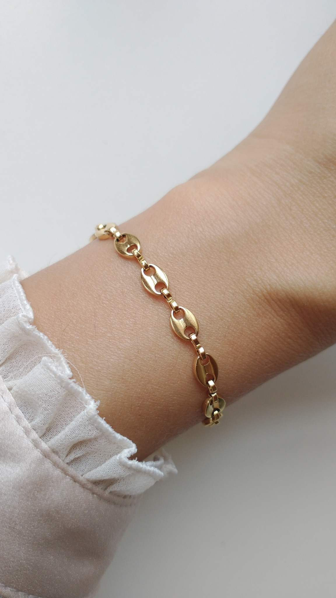 Pulsera de acero dorado